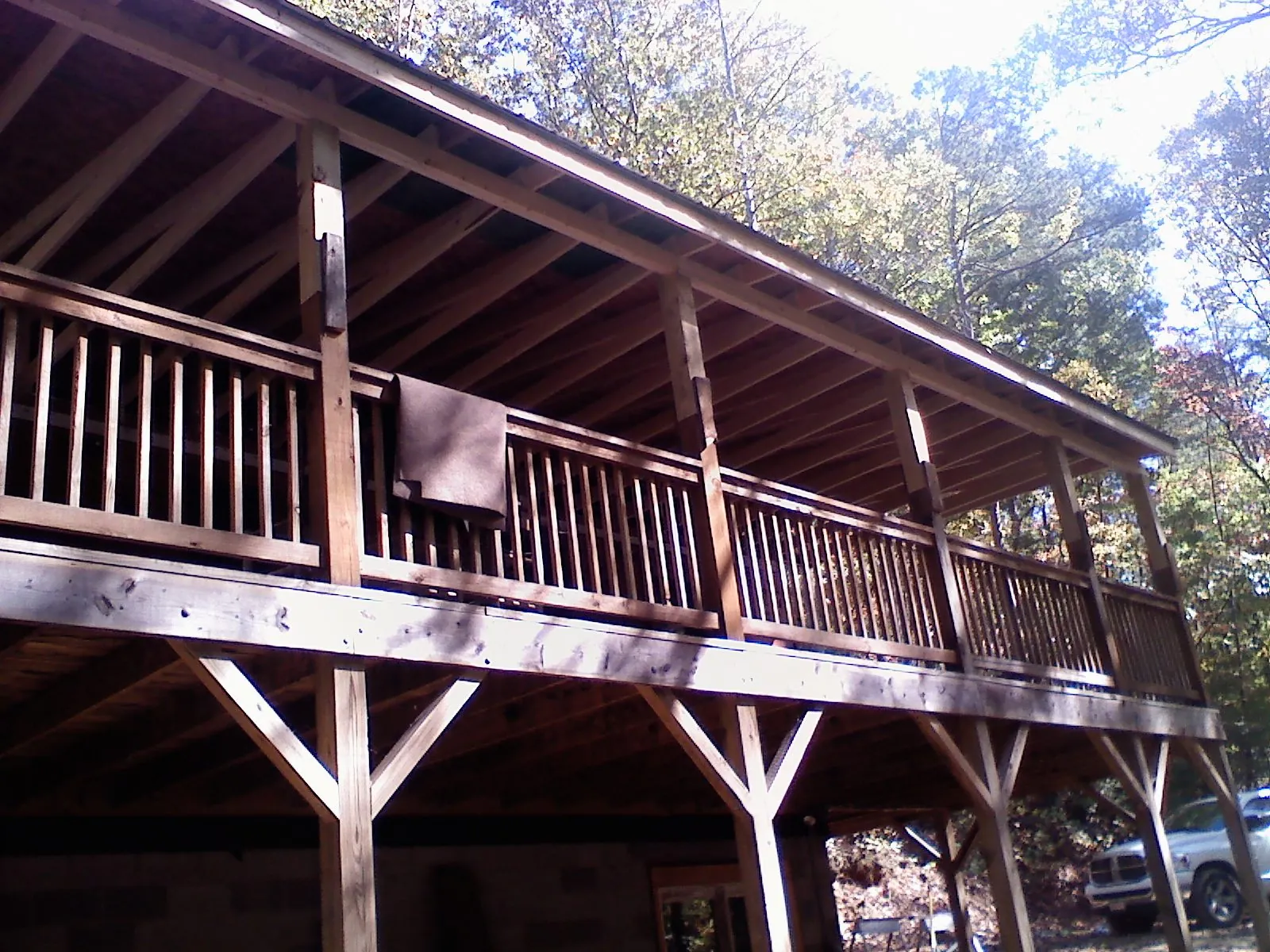 Timber framing under a new elevated porch and deck — Roof Leak Repair in San Francisco by Roofing Brothers